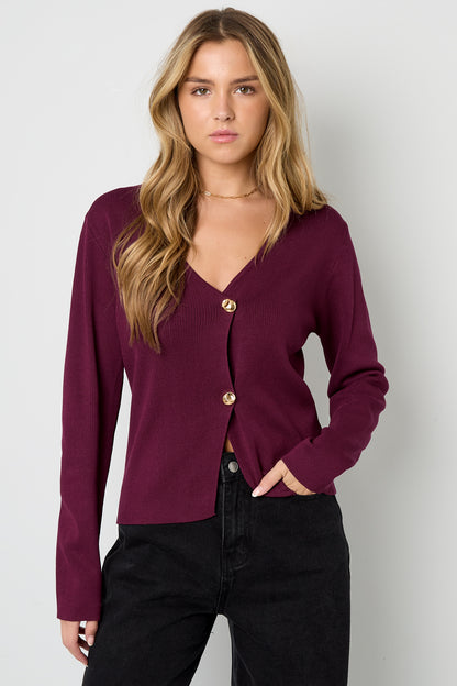 Eine symmetrische Strickjacke