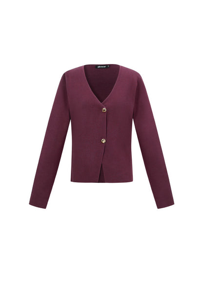 Eine symmetrische Strickjacke