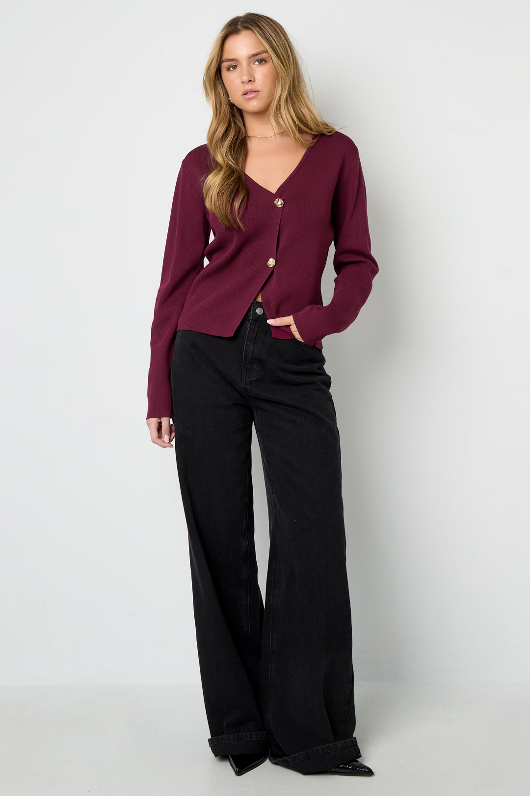 Eine symmetrische Strickjacke